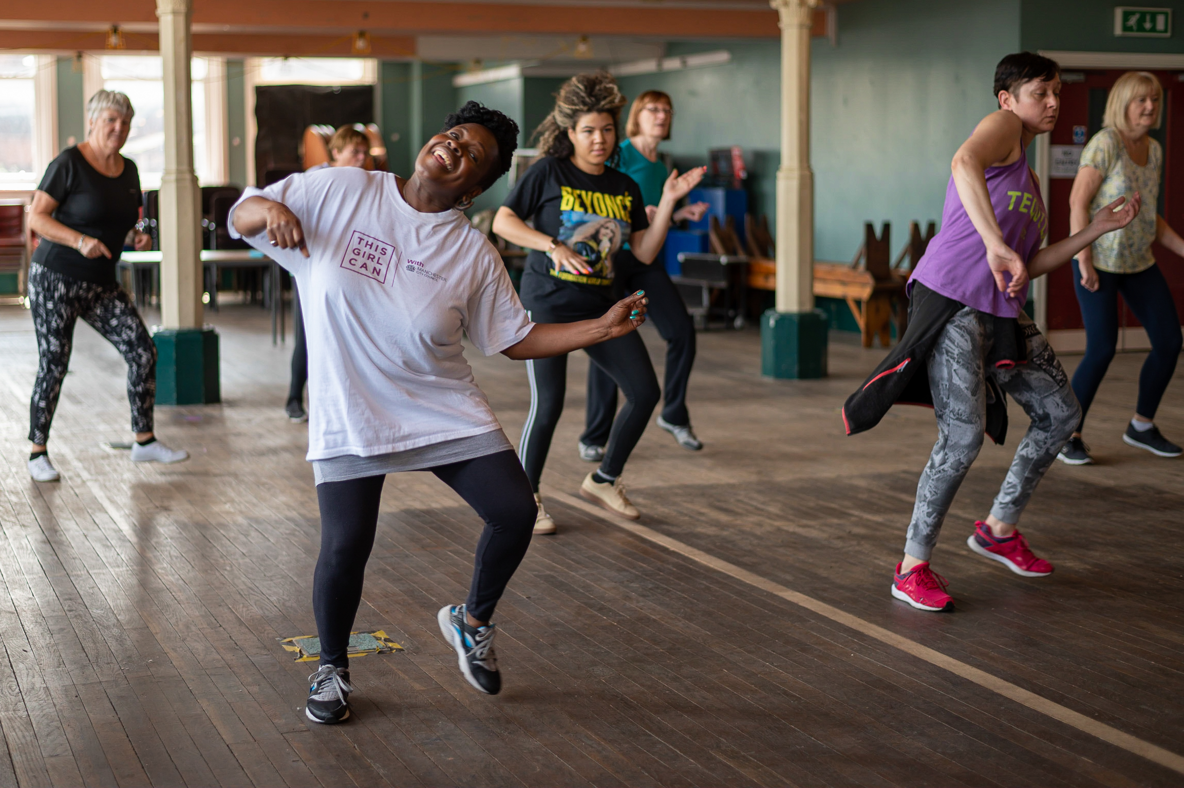 Group of ladies at a dance class, smiling