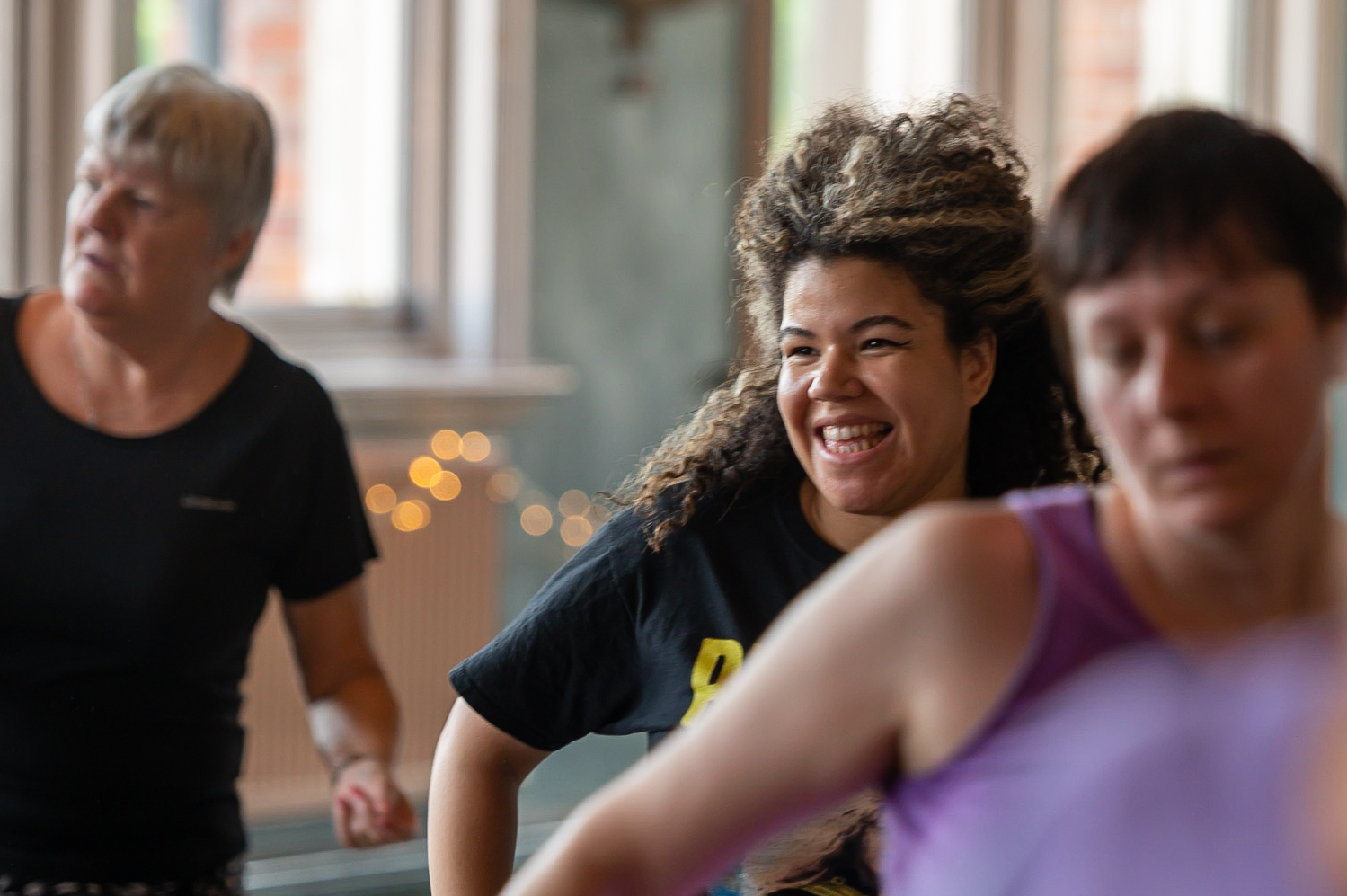 Girl smiling whilst dancing